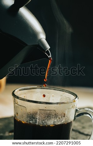 Similar – Senior Paar Hände gießen Kaffee aus der Thermoskanne.