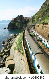 Italy. Cinque Terre. Train At Station Manarola Village