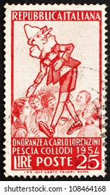 ITALY - CIRCA 1954: A Stamp Printed In The Italy Shows Pinocchio And Group Of Children, Carlo Lorenzini, Creator Of Pinocchio, Circa 1954