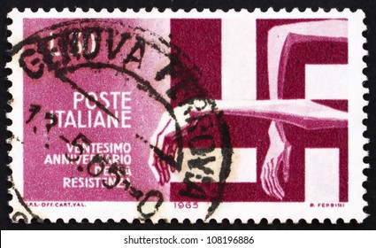 ITALY - CIRCA 1965: A Stamp Printed In The Italy Shows Victims Trapped By Swastika, 20th Anniversary Of Italian Resistance Movement During World War II, Circa 1965