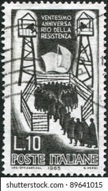 ITALY - CIRCA 1965: A Stamp Printed In Italy, Devoted To 20th Anniversary Of The Italian Resistance Movement During World War II, Shows The Italian Soldiers In Concentration Camp, Circa 1965