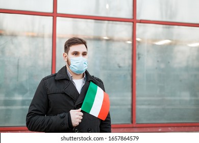 Italy Coronavirus Spreading Outbreak. Man In Medical Mask, Protective Mask With Italian Flag. Virus Epidemic, Chinese Coronavirusm Outbreak Influenza. Air Pollution, Novel Coronavirus In Europa EU.