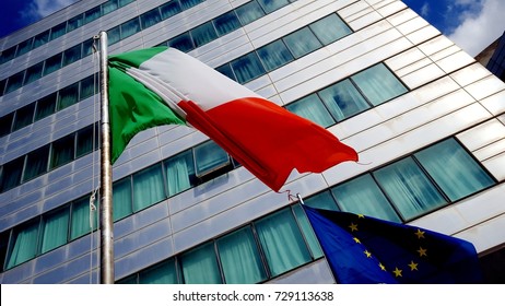 Italy And The Euro With Flags And A Bank In The Background 