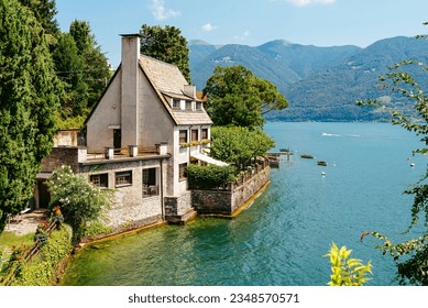 Italy, Lake Lugano. View of the lake, mountains, houses standing above the lake. - Powered by Shutterstock