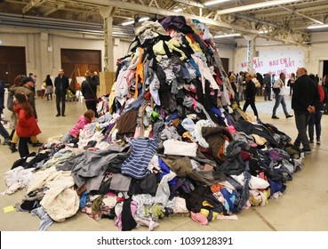 Italy, Lombardy region, city of Milan, november 1, 2017 - Hangar Bicocca pile of used clothes. Temporary exhibition.
