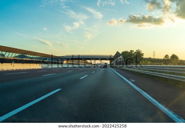 Italy main highway lane totally clear in summer\
holidays, highway crossing lane, high speed cars, perfect weather\
in summer day