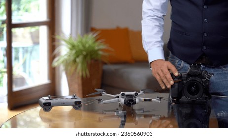 Italy , Milan - Real estate photographer use professional drone and camera to take pictures and video of the house - interior home shooting - home staging to sell the property apartment 