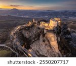 Italy November 24, 2024: aerial view of the village of San Leo with its fortress at sunset. We are in Emilia Romagna in the province of Rimini