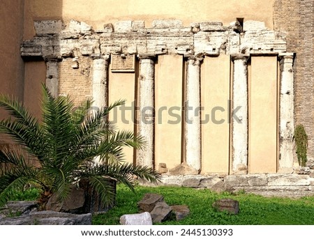 Italy. Rome. Modern city and ruins, ruins of an empire. Old Roman columns built into a modern city