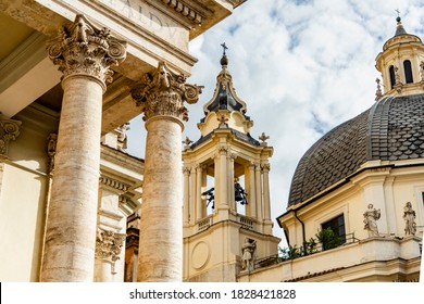 Italy, Rome. Piazza del Popolo, columns of Chiesa de Santa Maria del Montesanto, dome of Chiesa dei Miracoli.