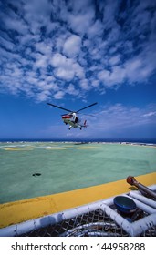 Italy, Sicily Channel, 	helicopter landing on an offshore oil-plant - FILM SCAN