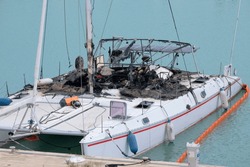 Italy, Sicily, Mediterranean Sea, Marina Di Ragusa (Ragusa Province); Sailing Boat Wreck Fire Burned In The Port 