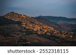 Italy, Sicily, Palermo Province, Gangi. Sunset view of the town of Gangi in the mountains of Sicily. August 2024.