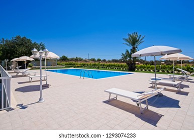 Italy, Sicily, Santacroce Camerina (Ragusa Province), countryside, house garden and swimming pool