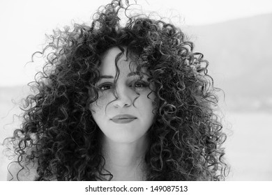 Young Woman Curly Hair Outdoors Girl Stock Photo (Edit Now) 1752605900