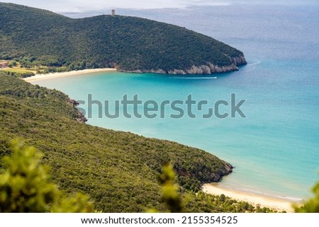 Italy Toscana Grosseto trekking at the Maremma Magliano Natural Park in Tuscany, panoramic view of the coast line, Cala di Forno and the medieval sighting tower