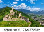 Italy, Trentino-Alto Adige, Borgo Valsugana - medieval old gothic castle ruins walls towers in the background mountains beautiful panorama from your holiday