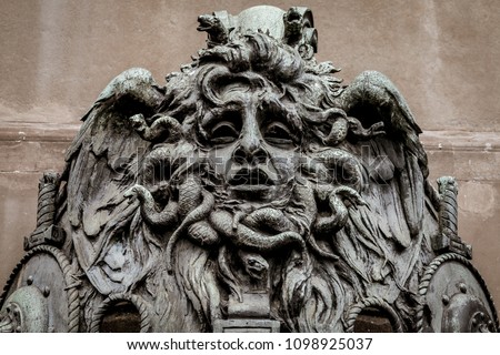 Italy, Turin. This city is famous to be a corner of two global magician triangles. This is a Medusa's head made of bronze close to the historical garden of Valentino in Turin.