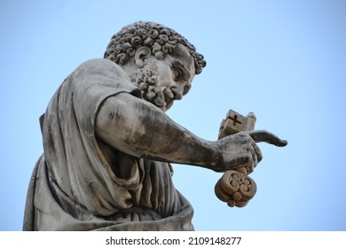 Italy, Vatican, St Peter Square, Marble Sculpture Pointing Down, Background With Blue Sky