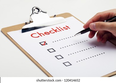 An Item On A Checklist Being Checked Off