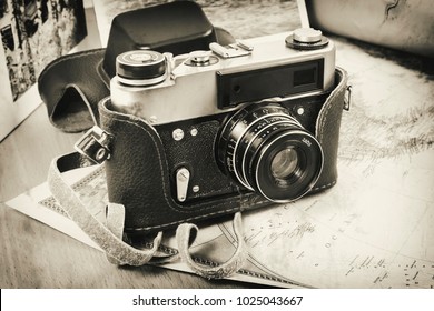 Items needed for the trip: camera, map of the world. Vintage items in retro style.