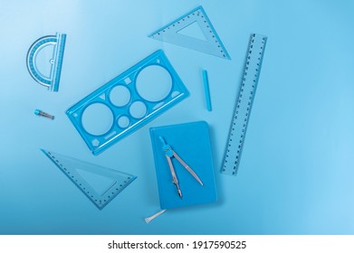 Items of the same color. Items for sketching. Notepad and rulers. Top.