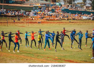 ITEN, KENYA, 22 JANUARY, 2022: Warm-up Of Kenyan Runners Before Athletic Running Training. Preparation For The Marathon And The World Championships In Athletics