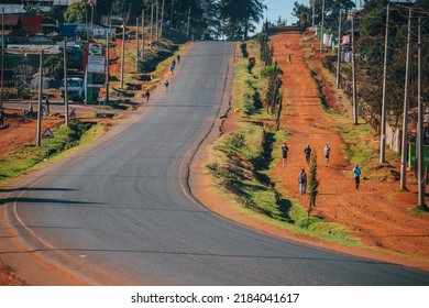 ITEN, KENYA, 22 JANUARY, 2022: The City Of Iten In Kenya. Main Road Lined With Red Dirt Roads. Home Of Running Stars Where Many Foreigners Come. For Training Running Camps Or For Marathon Preparation