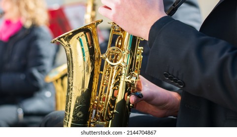 an itinerant jazz group plays on the streets of the world - Shutterstock ID 2144704867