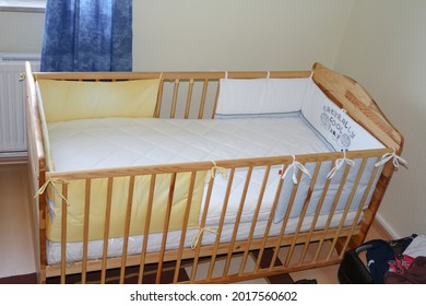 Itzehoe, Germany - Jun 2010: View Of Wooden Baby Crib In Bedroom. No People. 