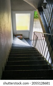 Itzehoe, Germany - Jun 2010: View Of Staircase Inside Cheap Apartment With Sunlight Through Window In Summer. No People.