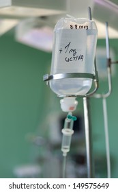 IV Bag Hanging On A Metal Pole In The Room