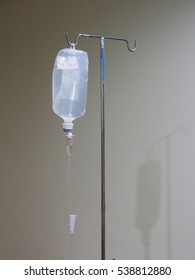 IV Bag Hanging On A Metal Pole In The Room,Soft Focus And Vintage Style.