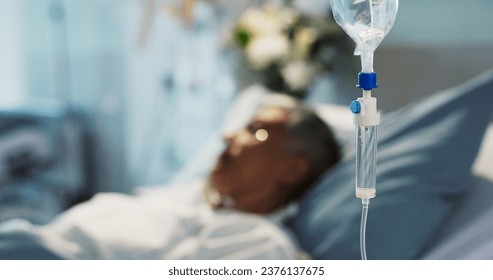 IV drip, healthcare and medicine with patient in hospital, treatment and surgery, healing or rehabilitation. Person at clinic, health with medication or liquid for infusion, service and recovery - Powered by Shutterstock