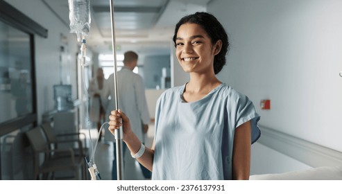 Iv drip, patient and portrait of happy woman in a hospital or clinic corridor with treatment for recovery from surgery. Intravenous, medicine and person with medical insurance for care and health - Powered by Shutterstock