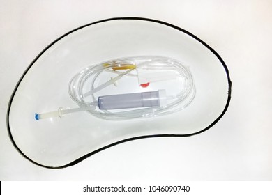 Iv Fluid System In A Medical Tray On A White Background