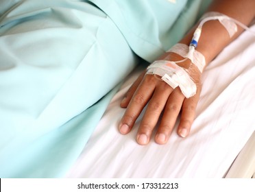 IV Solution In A Patients Hand