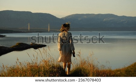 Similar – Image, Stock Photo Young woman over Norwegian fjord