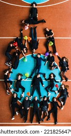 Ivano-Frankivsk, Ukraine May 15, 2021: Photo Of Students Lying On The Floor In The Gym, Top View, Students In Black Clothes, Drone Photo.