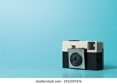 Ivrea - February 7, 2021. A Kodak instamatic 25 camera. Vintage camera, blue background