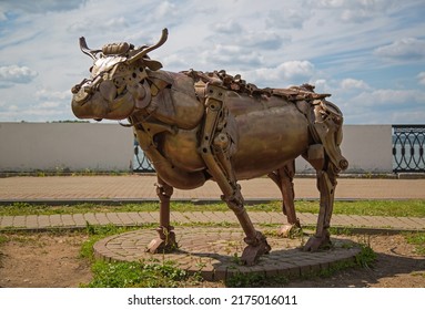 Izhevsk, Russia - July 02, 2022: Full size cow sculpture made from scrap metal