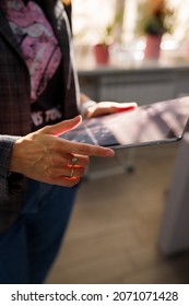 Izmail, Ukraine. May 2021. Soft Focused Vertical Close Up Shot Of Female Hands Holding Tablet, Natural Light Through Window. Business Woman In Office