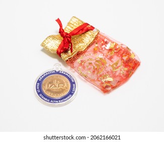 Izmir, Turkey, 10-22-2021, One Gram Gold And Gift Pocket On White Background