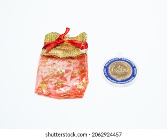 Izmir, Turkey, 10-24-2021, One Gram Gold And Gift Pocket On White Background