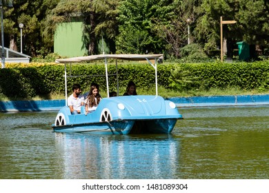 Izmir, Turkey, Aug 13th, 2019 - Family In Paddle Boat On Lake Inside Of Kültürpark (translated Culture Park), Also Known As Kulturpark In Izmir. 