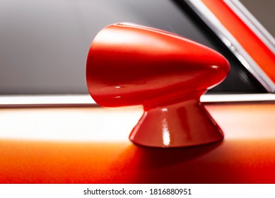 Izmir, Turkey - July 11, 2020: Close Up Shot Of An Orange Colored 1974 Pontiac Firebird’s Sideview Mirror.