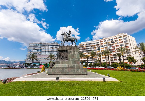 IZMIR, TURKEY - MAY 2014: Republic square\
and Ataturk Monument , Alsancak in May 05 2014 in Izmir, Turkey.\
Izmir is the third most populous city in\
Turkey