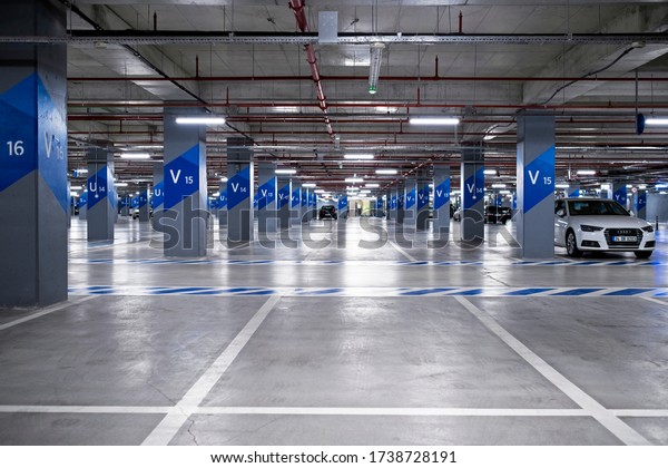 Izmir, Turkey - November  8, 2019: Shopping mall\
parking lot with no\
cars.