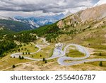 IZOARD PASS, FRANCE: winding road and "Refuge Napoleon" hotel,  road towards Cervieres and the North, top of famous high altitude alpine pass, Mercantour National Park, Alpes de Haute Provence