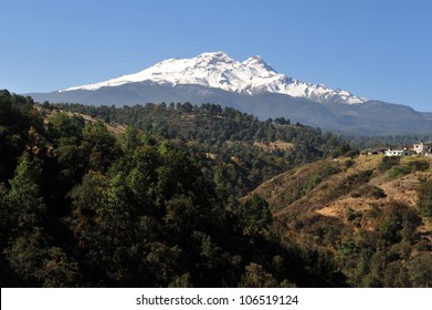 Iztaccihuatl volcano mountain 5,230 m in Izta-Popo Zoquiapan National Park near Puebla city, Mexico.It is the nation's third highest, after Pico de Orizaba at 5,636 m, and Popocatépetl at 5,426 m. - Powered by Shutterstock